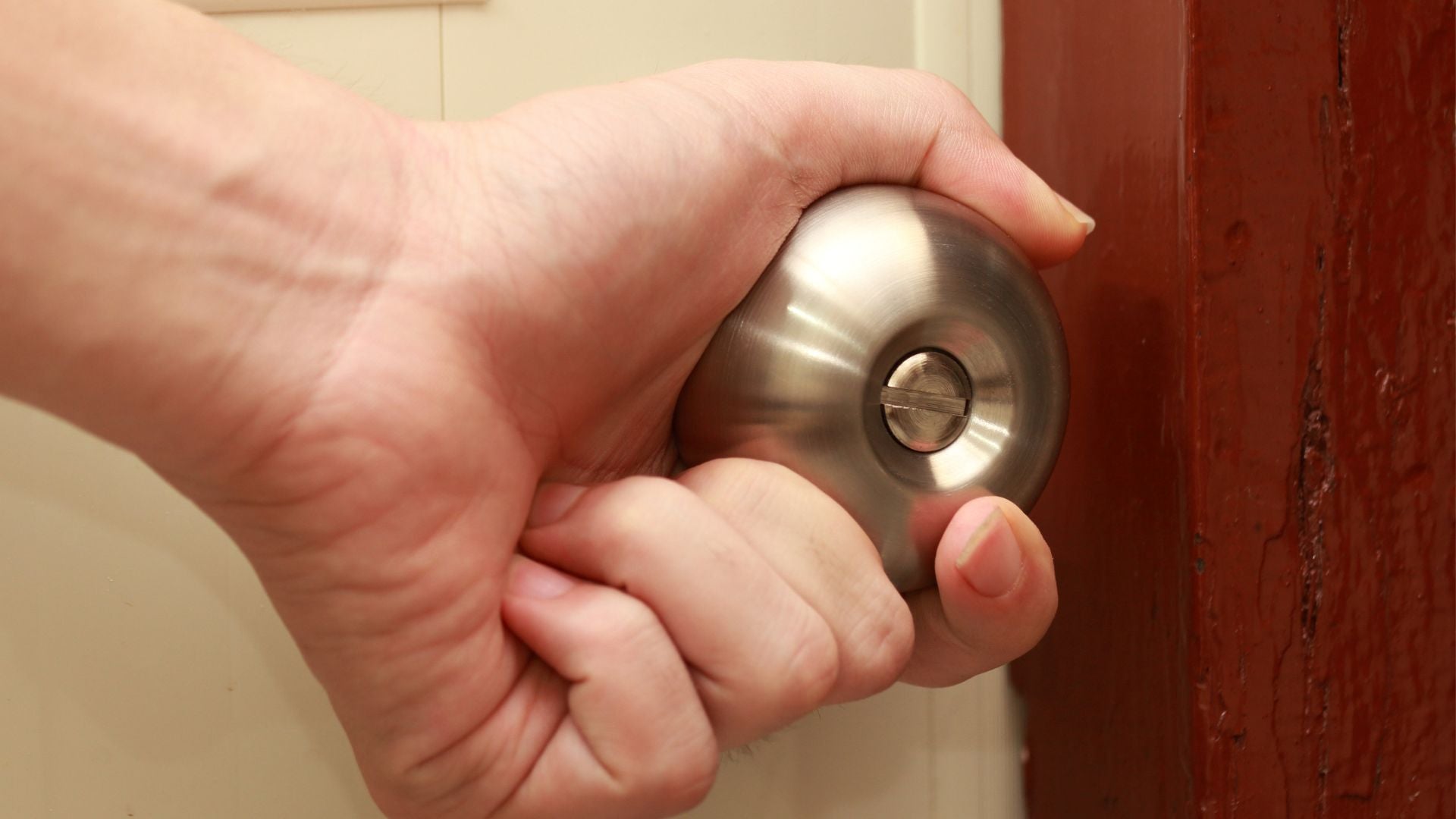 Hockey tape on doorknob to prevent slipping for grip