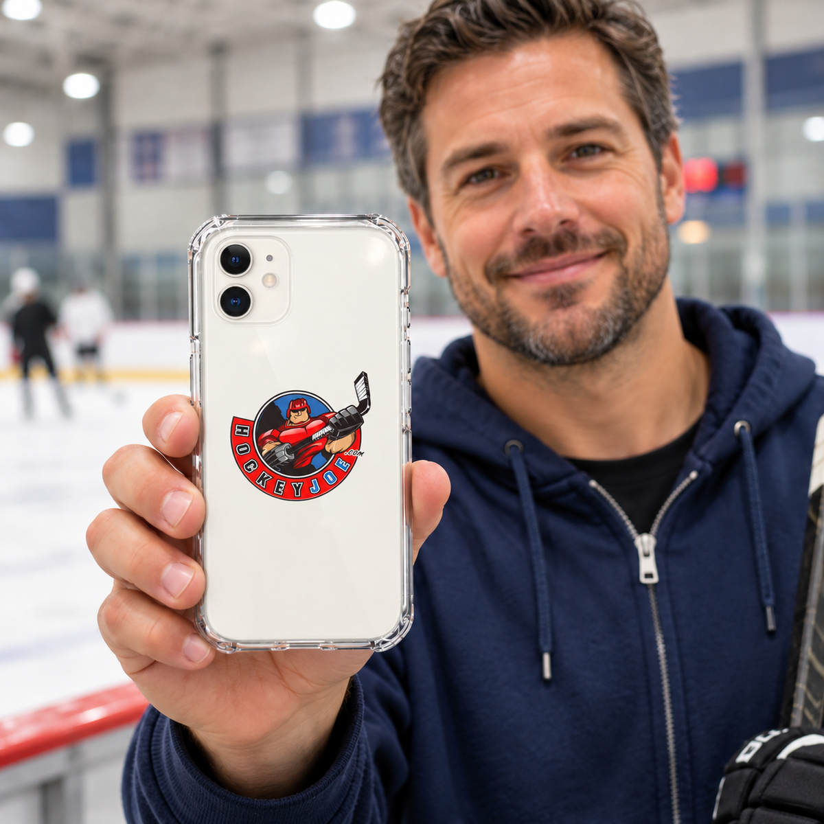 Hockey Joe clear case for iPhone 11 — rink-side lifestyle mockup; phone not included
