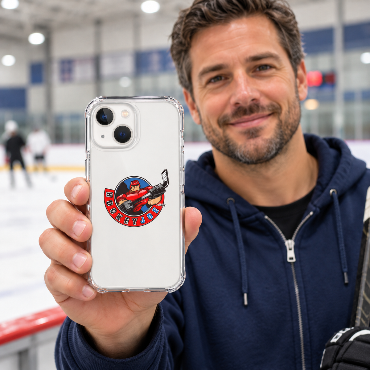 Hockey Joe clear case for iPhone 13 mini — rink-side lifestyle mockup; phone not included