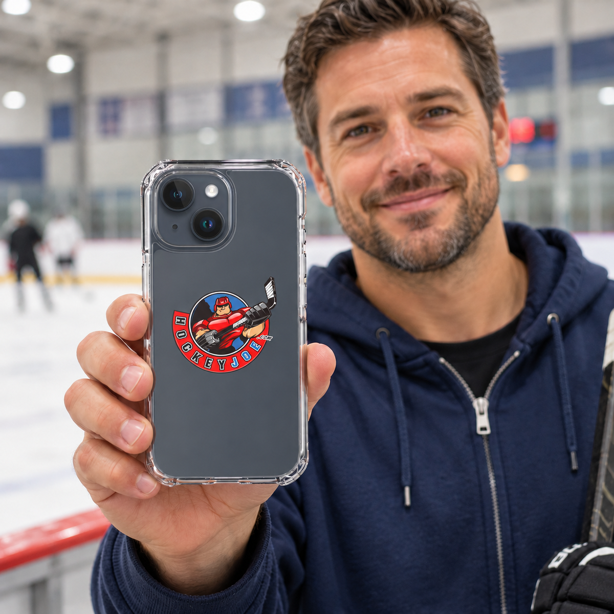 Hockey Joe clear case for iPhone 15 — rink-side lifestyle mockup; phone not included
