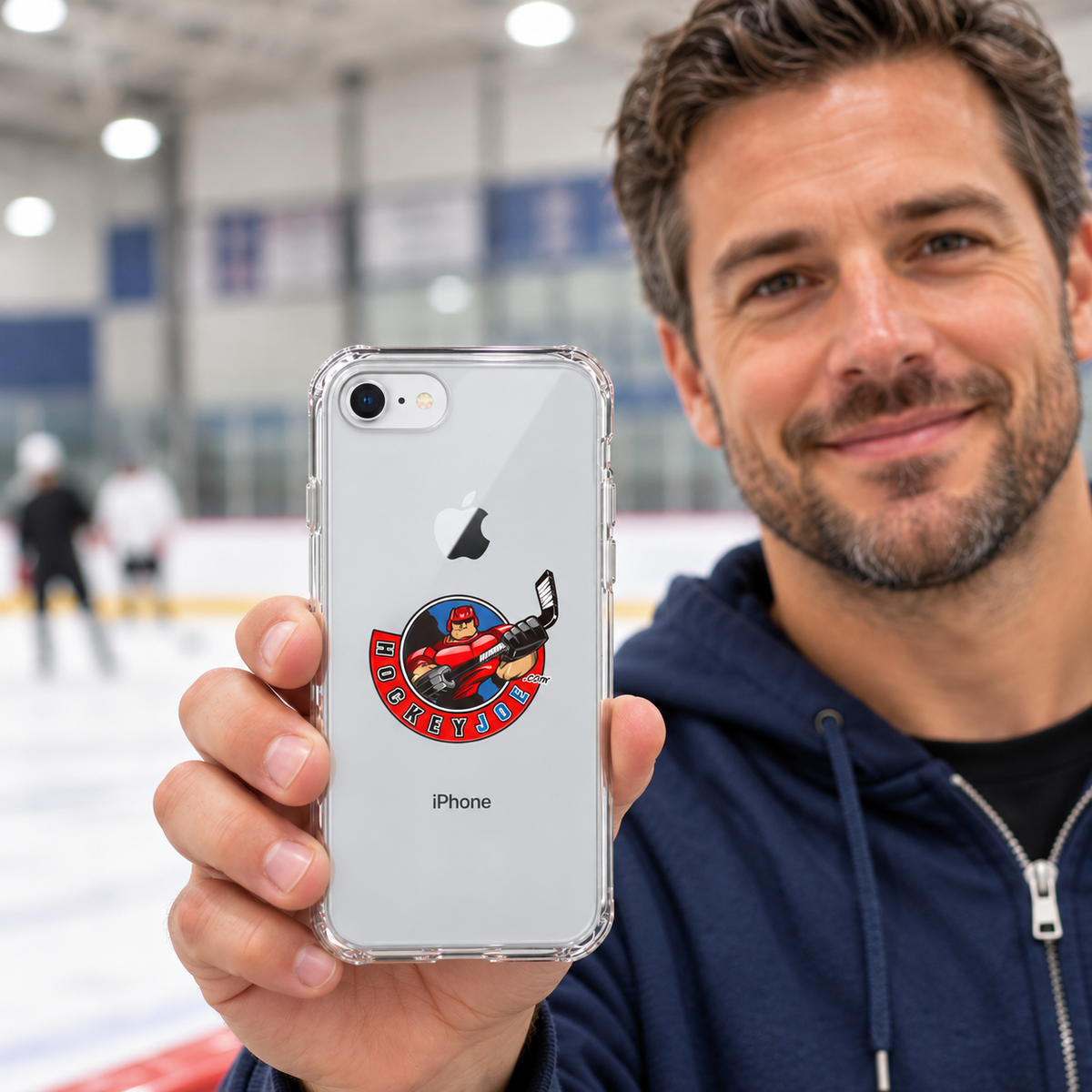 Hockey Joe clear case for iPhone 7/8 — rink-side lifestyle mockup; phone not included