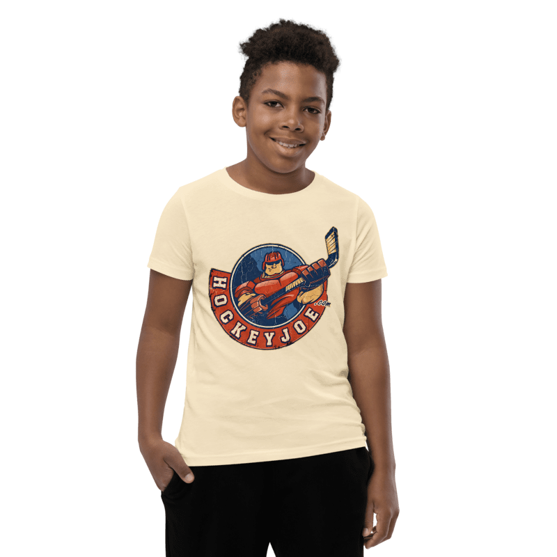 Boy wearing the Hockey Joe Youth Vintage T-Shirt in Natural